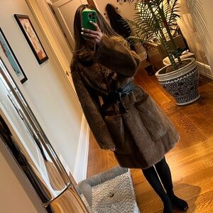 Brown mink coat with lamb skin leather lining.